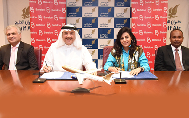 Batelco Bahrain CEO Eng. Muna Al Hashemi and Gulf Air CEO Maher Salman Al Musallam sign the new agreement in the presence of Gulf Air Director of Information Technology, Dr. Jassim Haji, (left) and Batelco General Manager Enterprise & Government Division Sutha Siva.