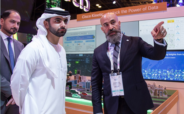 Shukri Eid, Managing Director – East Region, Cisco Middle East presents to HH Sheikh Mansoor bin Mohammed bin Rashid Al Maktoum at Cisco’s GITEX stand