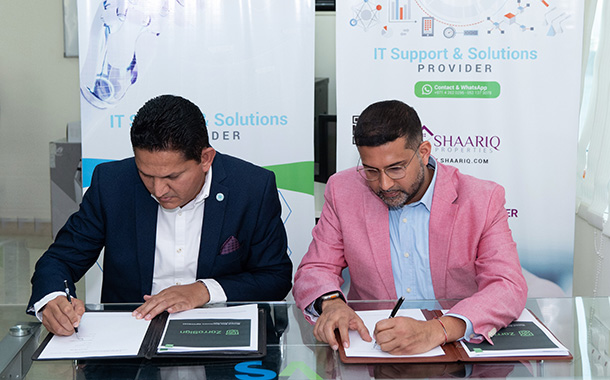 (Left- Vision Tech Solutions CEO, Rajab Ali Virani, and Right - ZorroSign CEO, Shamsh Hadi, sign partnership agreement)