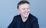 Matthew Prince smiling in a black blazer – CEO and Co-founder of Cloudflare