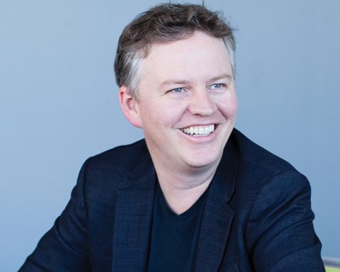 Matthew Prince smiling in a black blazer – CEO and Co-founder of Cloudflare