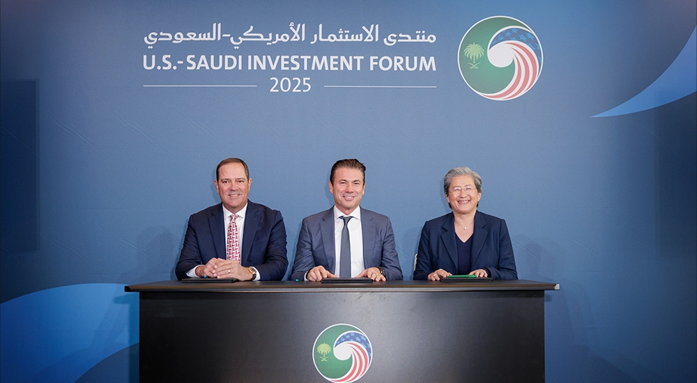 Chuck Robbins_ Chair and CEO of Cisco_ Tareq Amin_ CEO of HUMAIN and Dr. Lisa Su_ Chair and CEO