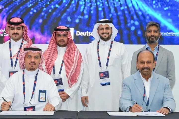 Rqeem and Torry Harris sign landmark