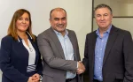 Nokia's Lorraine Twigg, Vice President of Global Strategic Partnerships and Kamal Ballout, Head of Enterprise and Partners for Network Infrastructure, with Westcon-Comstor CEO David Grant as they sign the MEA agreement