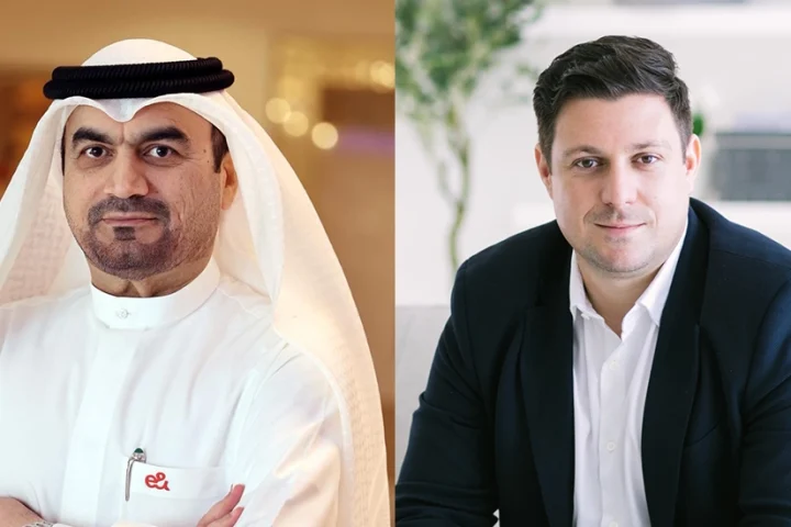 (L-R) Abdulla Ebrahim Al Ahmed, Chief Government & VVIP Relations Officer, e& UAE and Dr Aleksandar Valjarevic, Acting Chief Executive Officer at Help AG.