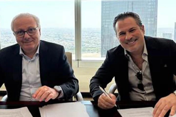 (L-R) Nagib Bahous, Chairman of ACE Gallagher Holding; Ibrahim Arqawi, Executive Director, ACE Gallagher Kuwait.